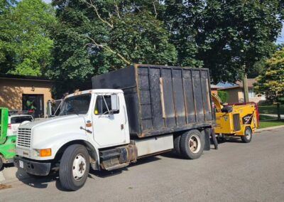 Our trucks in front of a property